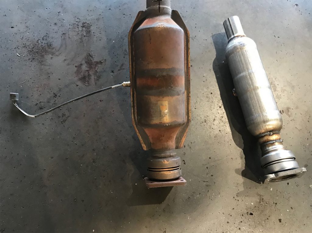 Old catalytic converter and new catalytic converter.