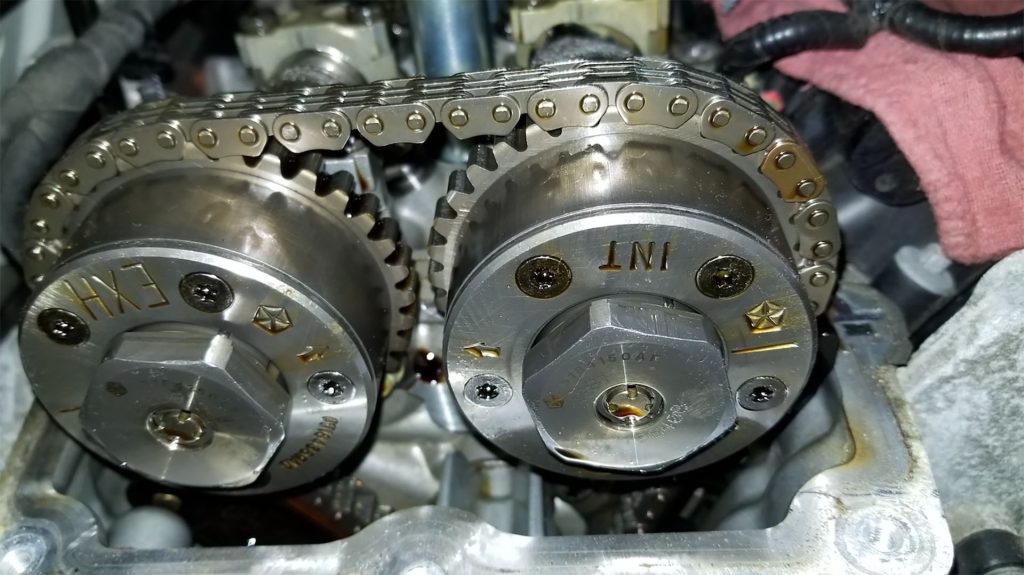 Timing chain around oil control camshaft actuators.