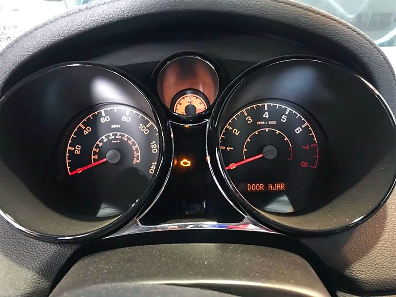 Check engine light on dashboard.