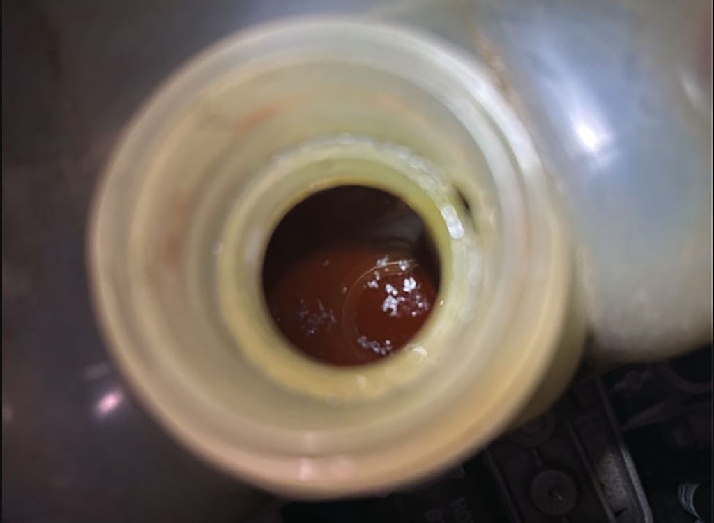 Contaminants in coolant on Chrysler Pacifica.