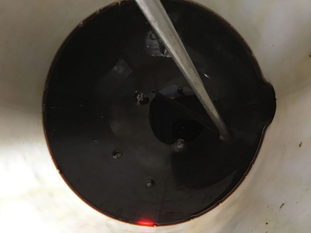 Black transmission fluid on Ford Focus.