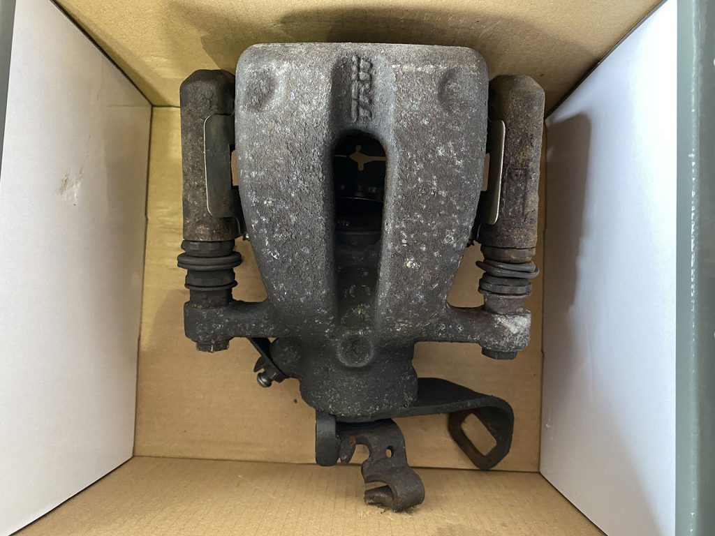 Used brake caliper for Mini Cooper.