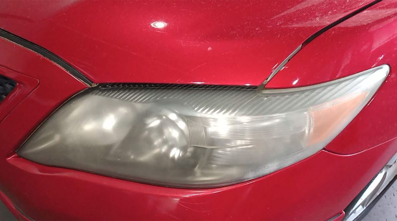 Foggy headlights on a Toyota Camry.