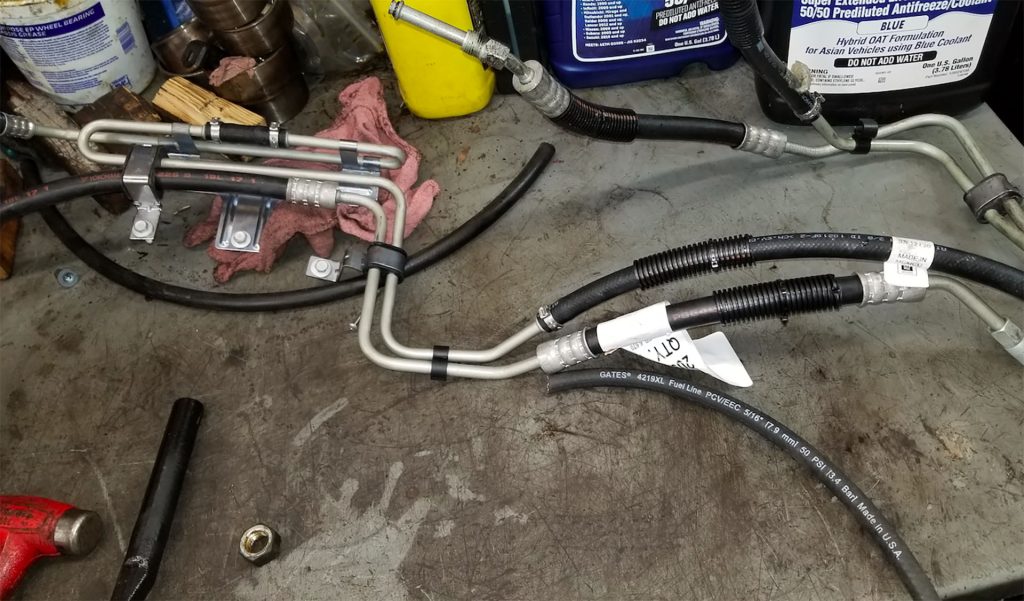Power steering cooler line assembly.