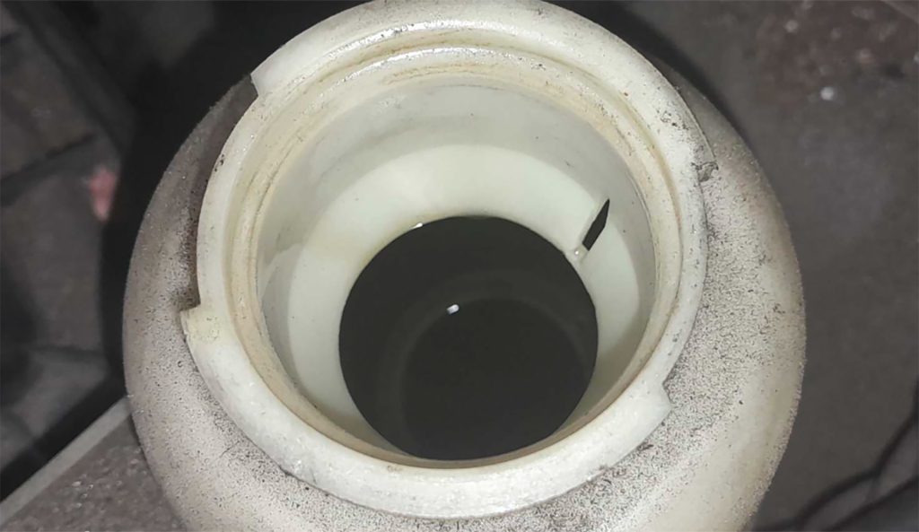 Dark power steering fluid on a Jeep Grand Cherokee.