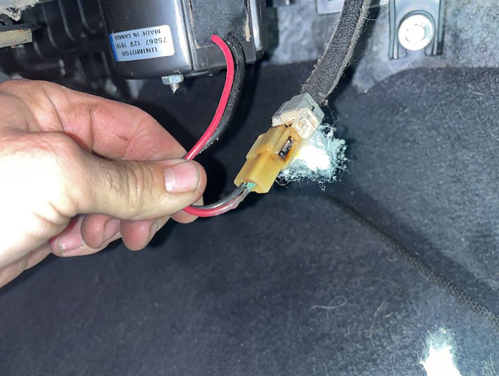 Resistor connector and blower motor connector melted together.