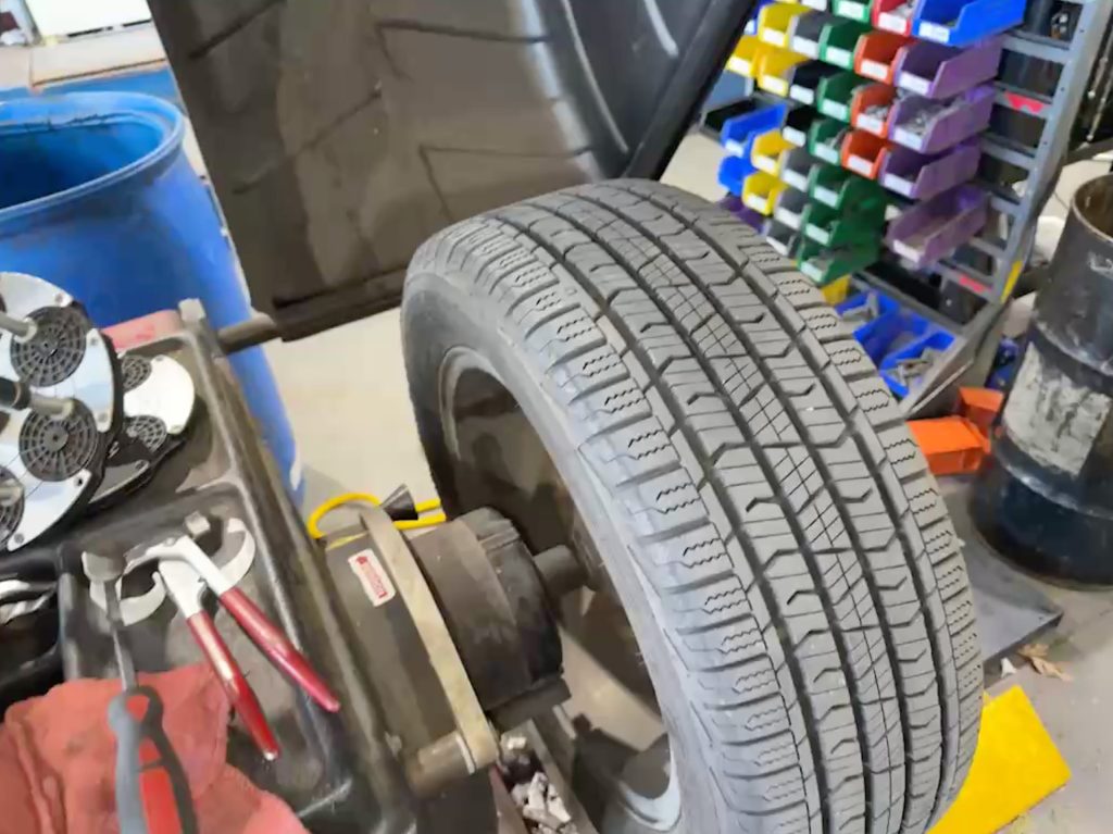 Tire balancing on a Jeep Patriot.