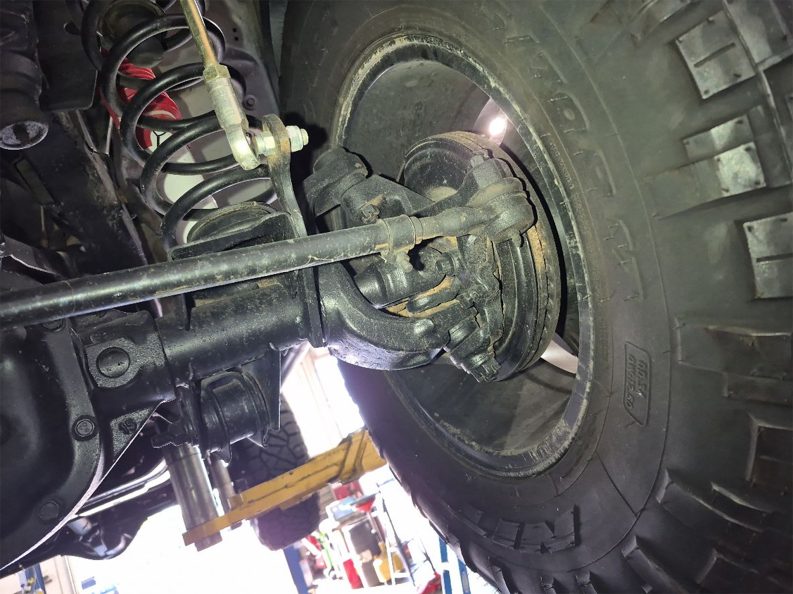Suspension system repairs on Jeep Wrangler.